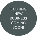 A sign announces "EXCITING NEW BUSINESS COMING SOON!"