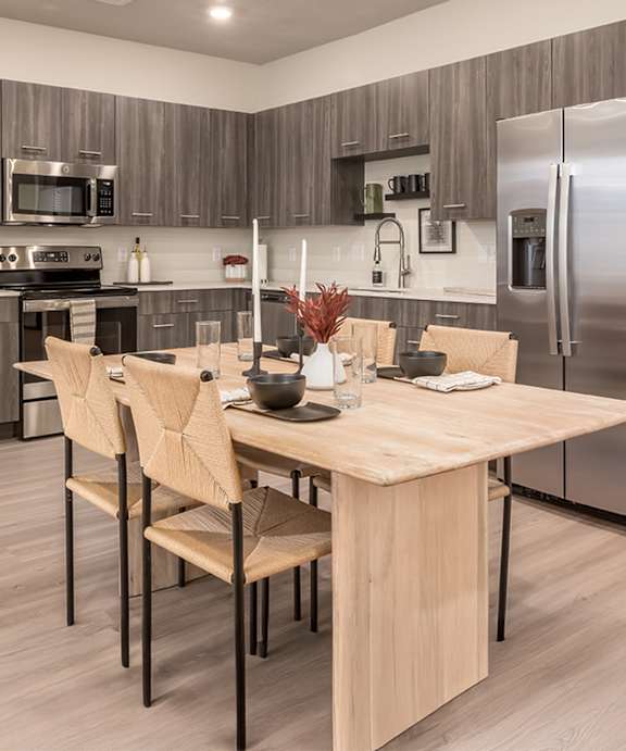 Wooden Dining Table at H2O Townhomes, West Valley City, Utah