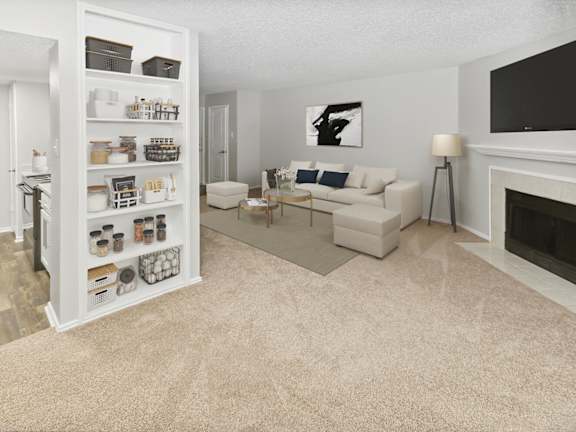 Model Living Room with Carpet and Fireplace at Autumnwood Apartments located in Arlington, Texas.