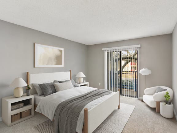 Model Bedroom with Carpet and Patio Accessibility at Grandstand Apartments in Marietta, GA-LRGAM.
