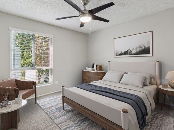 Model Bedroom with Carpet and Window View at Colonnade at Fletcher Hills Apartments in El Cajon, CA-LRGAM.