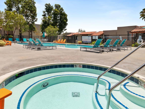 Hot tub and pool at Colonnade at Fletcher Hills Apartments in El Cajon, CA.