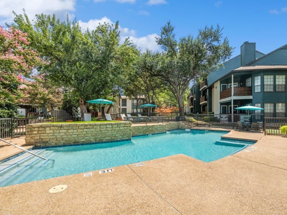 Swimming pool at Bridges at Deer Run Apartments in Dallas, TX.