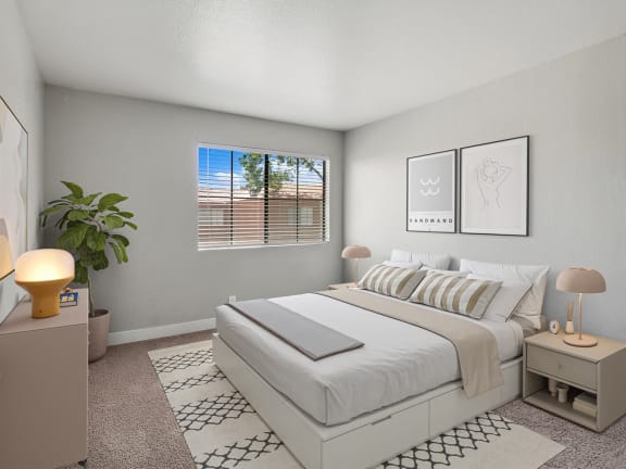 Model Bedroom with Carpet at Stonegate Apartments in Las Vegas, NV-LRGAM.
