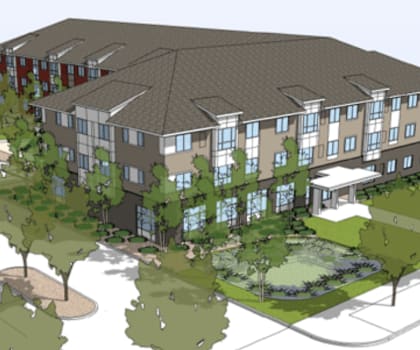 A rendering of a modern building with a large front lawn and trees.