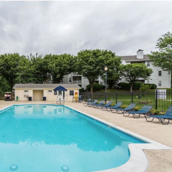 a resort style pool and lounge chairs at Madison at Eden Brook, Columbia, Maryland, 21046