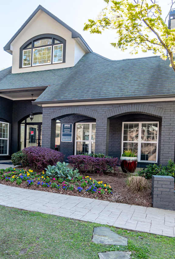 a home with a front yard and a sidewalk