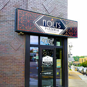 The front of a pizzeria named Noli's.