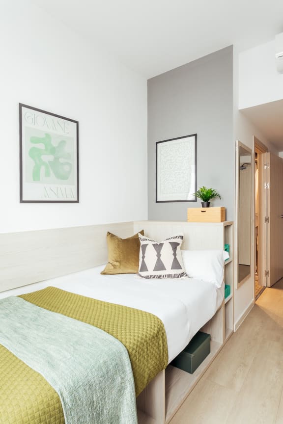 a bedroom with a bed and a closet