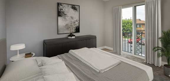 A bedroom with a large bed, a nightstand, and a painting on the wall.