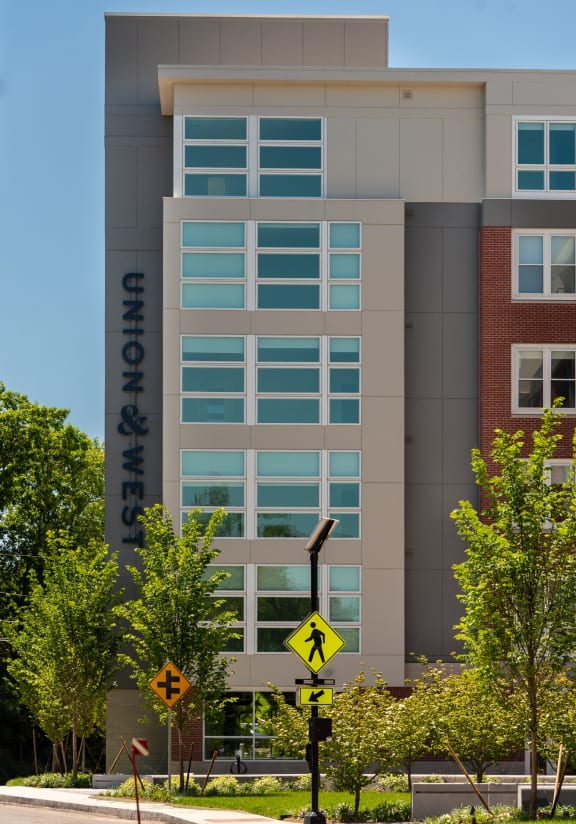 a building with a street sign in front of it