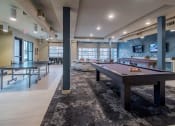 Thumbnail 7 of 24 - Office Clubhouse game room at Seleno at Bridge Street, Huntsville, Alabama