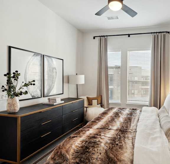 Bedroom with Bed at Bridges at Flatiron, Broomfield, CO