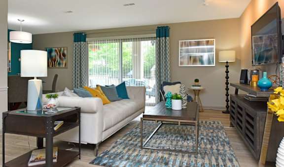 a living room with a couch and a table