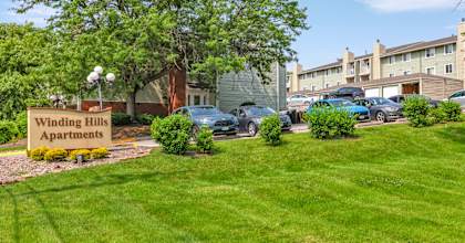 Green Space And Property Signage at Winding Hills Apartments, Davenport, IA
