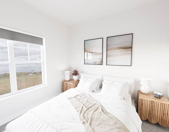 A bedroom with a large bed and two pictures on the wall at Solhaven Grand Chute, Wisconsin 54913