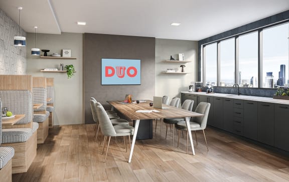 a kitchen and dining room with a table and chairs