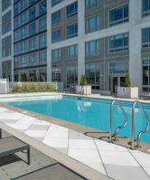 a swimming pool in front of a building at 360 State Street, New Haven