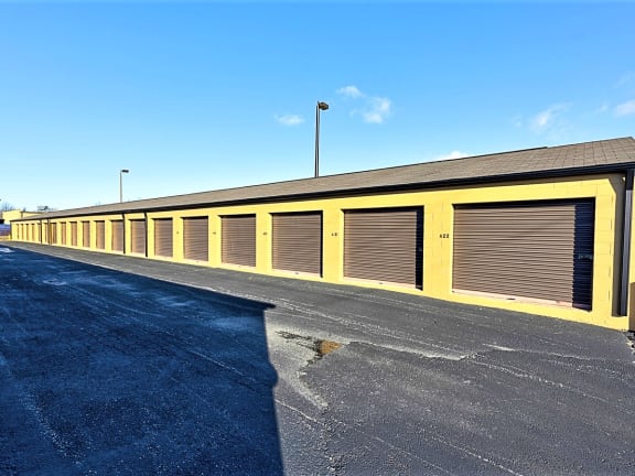 a row of garages with roller doors