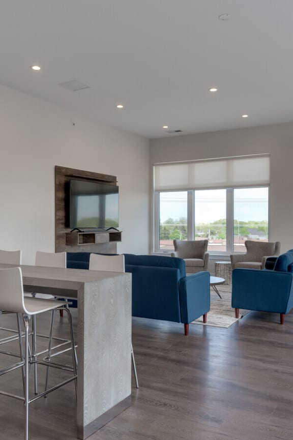 a kitchen with stainless steel appliances and a counter top