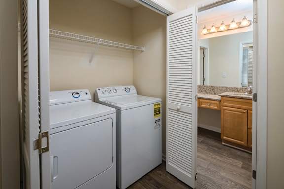A laundry room with a washer and dryer.