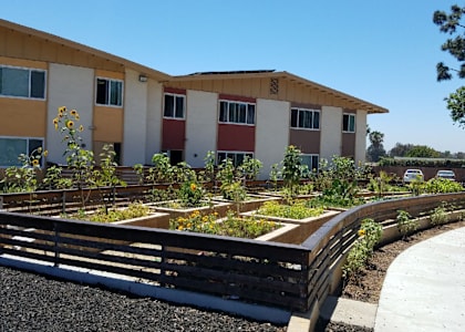 a garden in front of a building