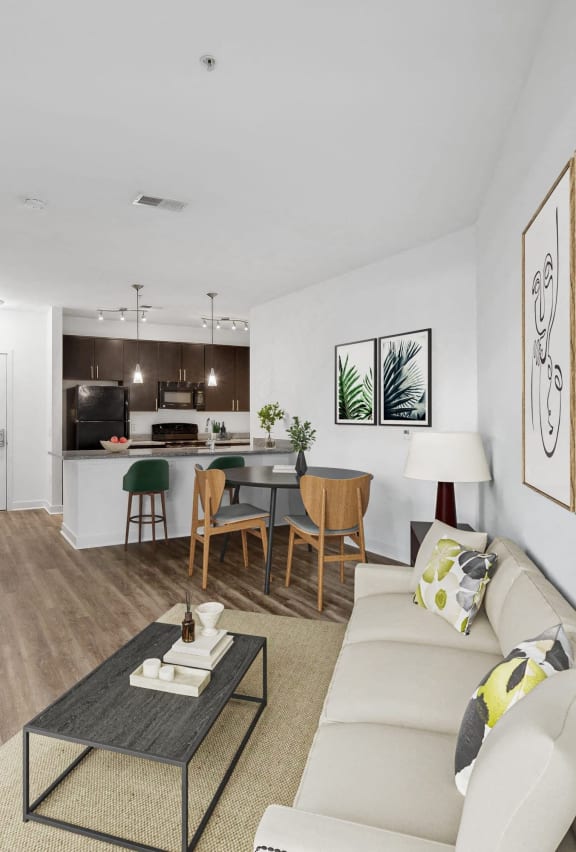 a living room with a couch and a table at Fort Totten Square, Washington, Washington DC