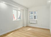 Thumbnail 17 of 23 - Well Lit Bedroom