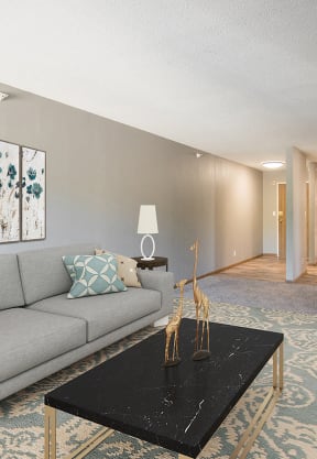 a dining area with tables and chairs and a blue accent wall