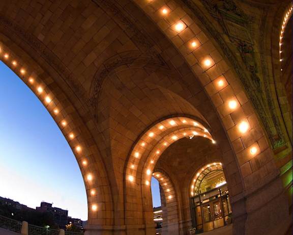 A series of arches with lights on them. at The Pennsylvanian Apartments, Pittsburgh, Pennsylvania