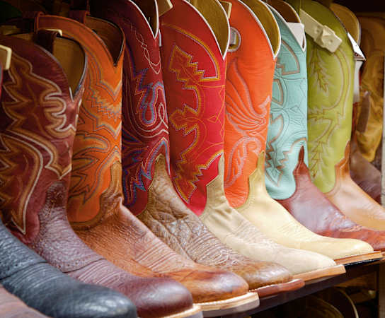 a row of cowboy boots at The Park at Monterey Oaks, Texas