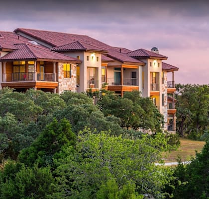 a group of houses on top of a tree