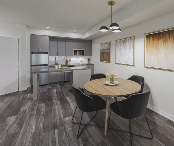 Custom Kitchen with sleek cabinetry, spacious island and eating area