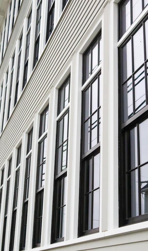 A building with many windows on the side.