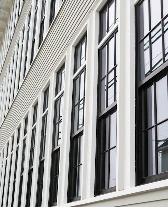 A building with many windows on the side.