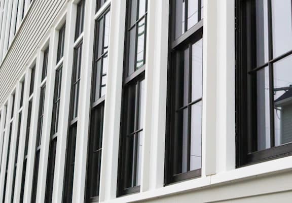 A building with many windows on the side.
