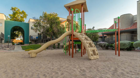 Camino Seco Village playground with fun slide