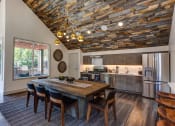 Thumbnail 4 of 50 - Dining table and chair at Commons at Redwood Creek Apartments, Beaverton, OR