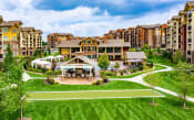 Thumbnail 1 of 42 - an aerial view of a large building with a green lawn in front of it