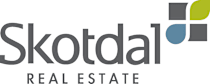 The image is a logo for Skotdal Real Estate.