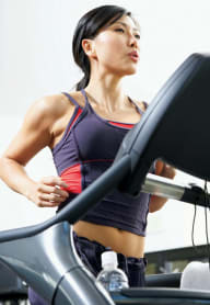 a woman running on a treadmill at Regatta at New River, Fort Lauderdale, FL