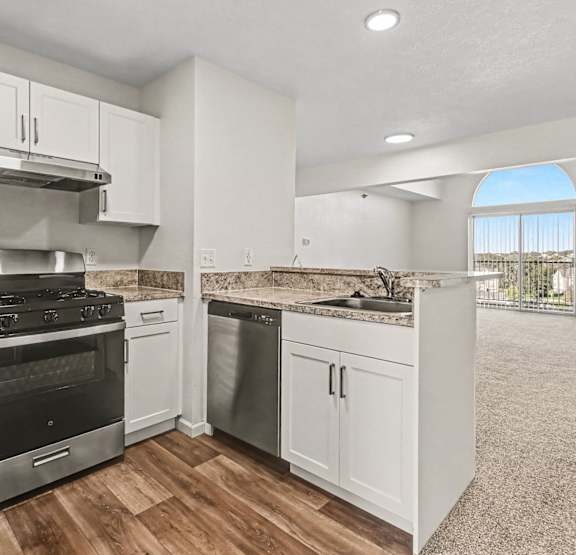 Upgraded kitchen with breakfast bar at West Hampton Park Apartment Homes in Elkhorn, NE