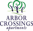 a logo for arbor crossing apartments with a tree in the logo