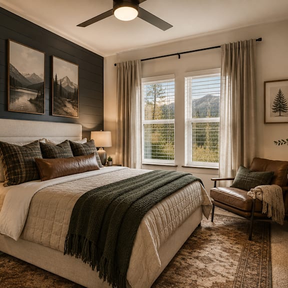an empty bedroom with a bed and a ceiling fan