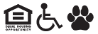 a man sitting on a wheelchair in front of a house