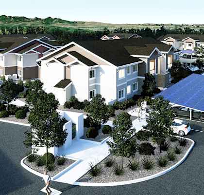 an aerial view of a neighborhood with houses with solar panels