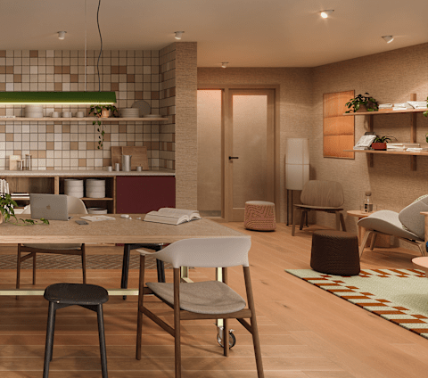 A modern kitchen with a dining table and chairs.