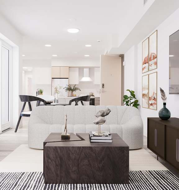 A modern living room with a white sofa and a wooden coffee table.