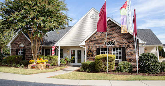 A house with a flag on the front.