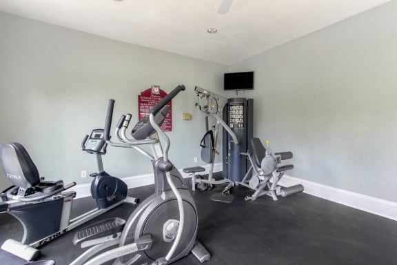 Fitness Center with Exercise Equipment and Mounted TV